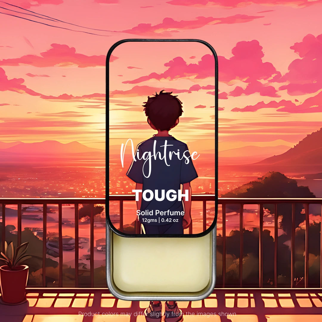 Nightrise Tough solid perfume tin with evening theme and sunset background