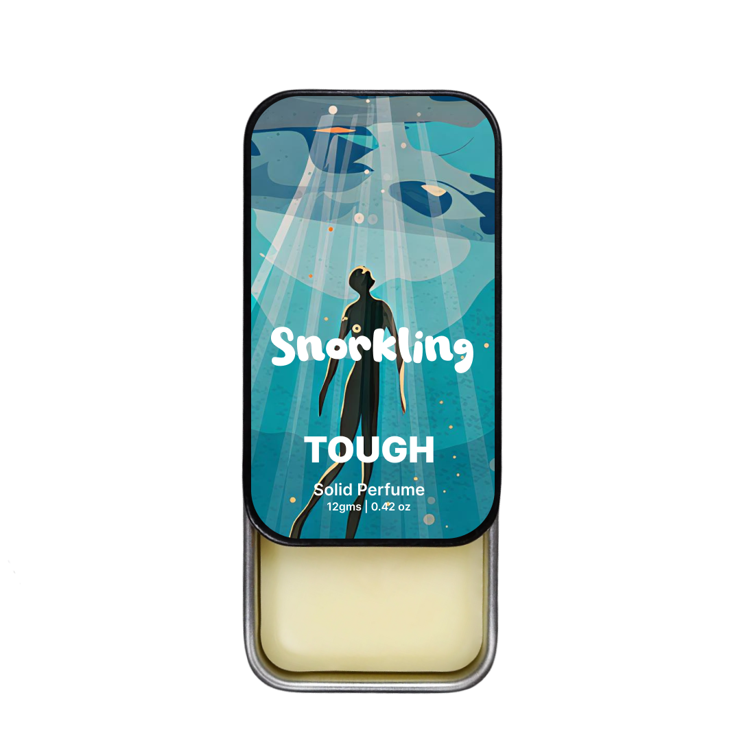 Tough solid perfume tin with 'snorkling' branding